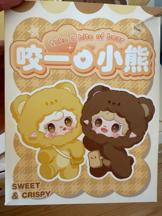 Yooki take a bite of bear